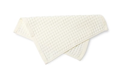 Photo of Clean beige waffle towel isolated on white, top view