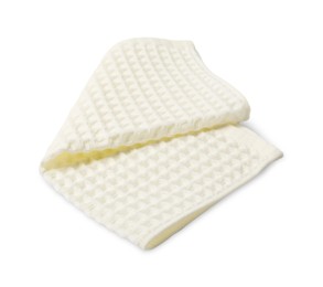 Photo of Clean beige waffle towel isolated on white