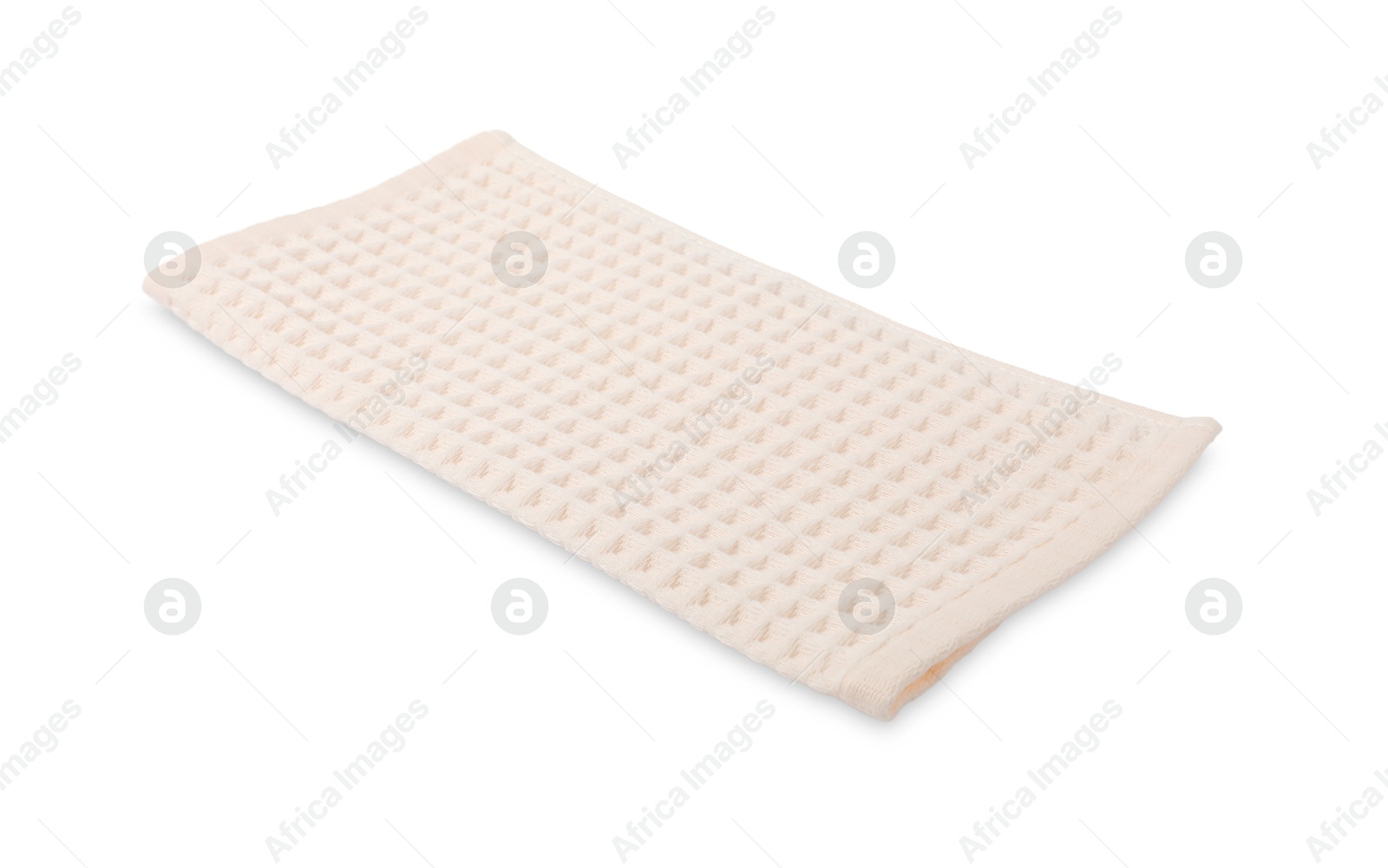 Clean beige waffle towel isolated on white Photo of Clean beige waffle towel isolated on white