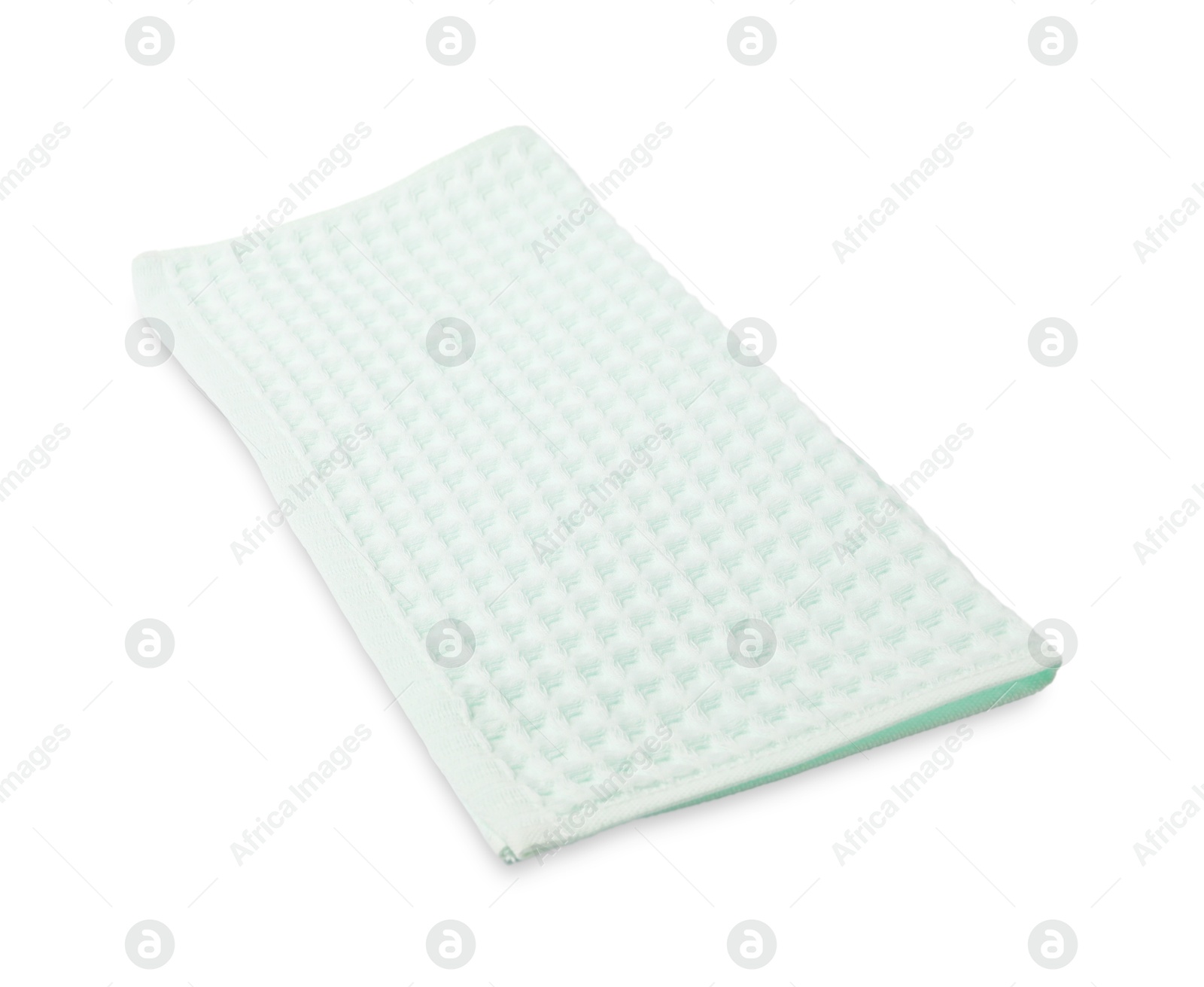 Clean light turquoise waffle towel isolated on white Photo of Clean light turquoise waffle towel isolated on white