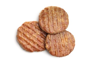 Photo of Three delicious hamburger patties isolated on white, top view