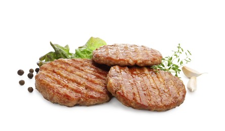 Photo of Delicious hamburger patties and spices isolated on white