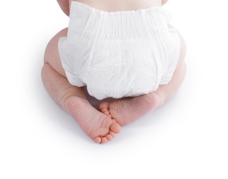 Photo of Cute little baby in diaper on white background, top view