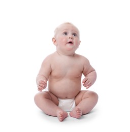 Photo of Cute little baby sitting on white background