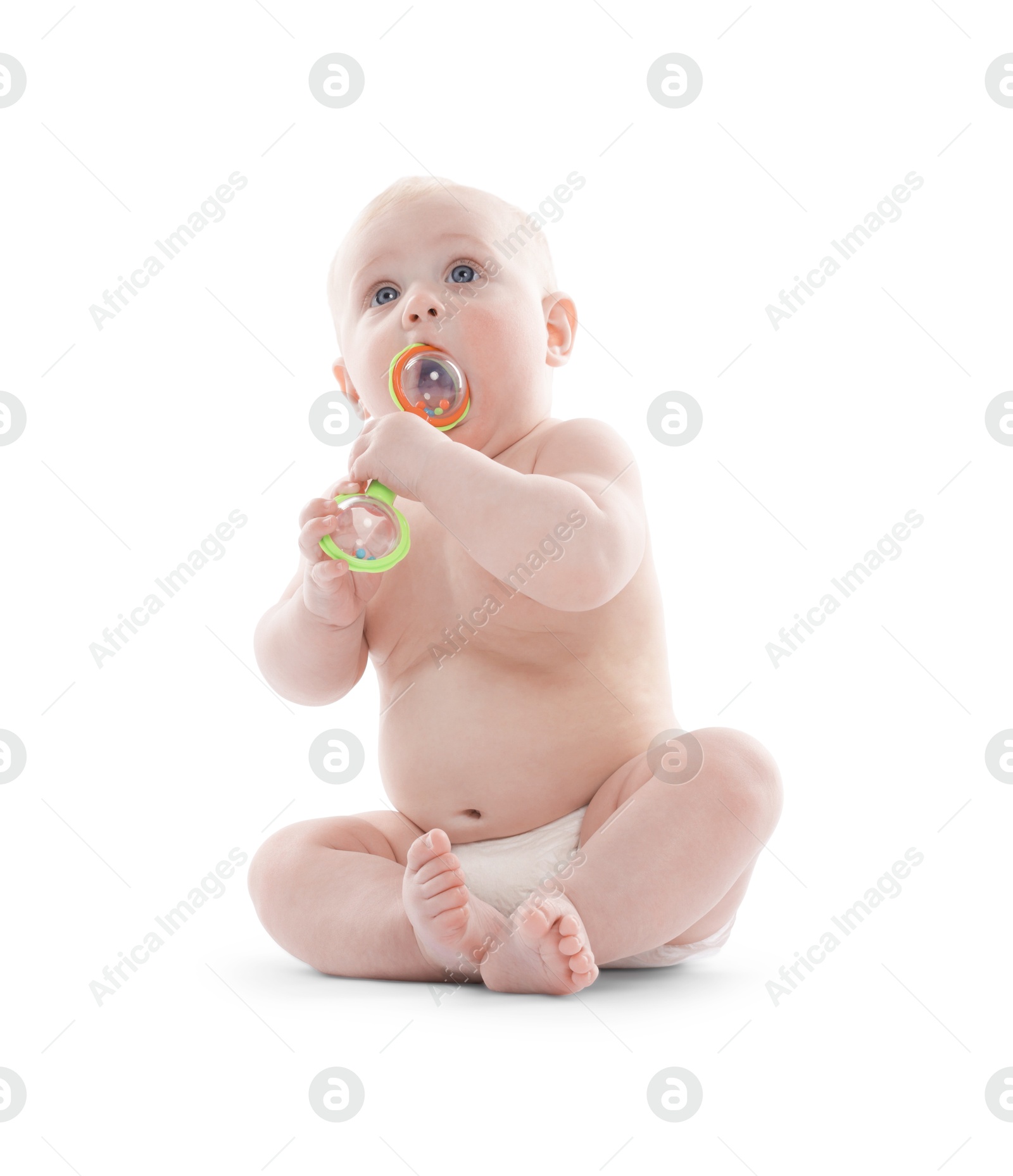 Cute little baby with rattle on white background Photo of Cute little baby with rattle on white background