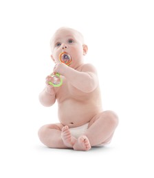 Photo of Cute little baby with rattle on white background