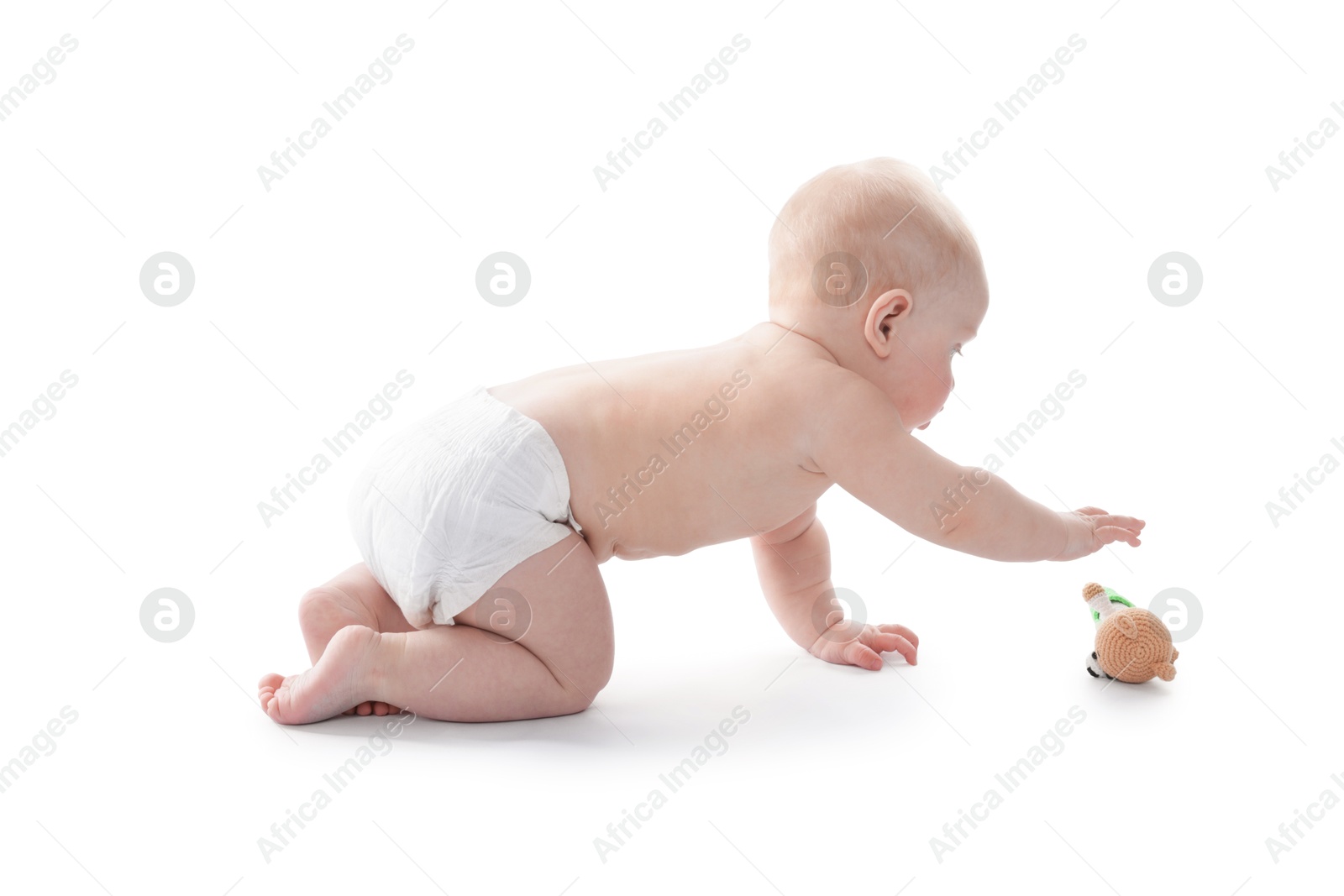 Cute little baby with knitted toy bear on white background Photo of Cute little baby with knitted toy bear on white background