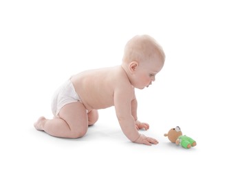 Photo of Cute little baby with knitted toy bear on white background