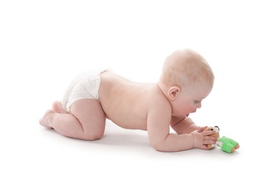 Photo of Cute little baby with knitted toy bear on white background