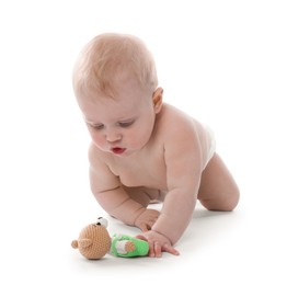 Photo of Cute little baby with knitted toy bear on white background