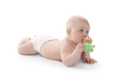 Photo of Cute little baby with knitted toy bear on white background