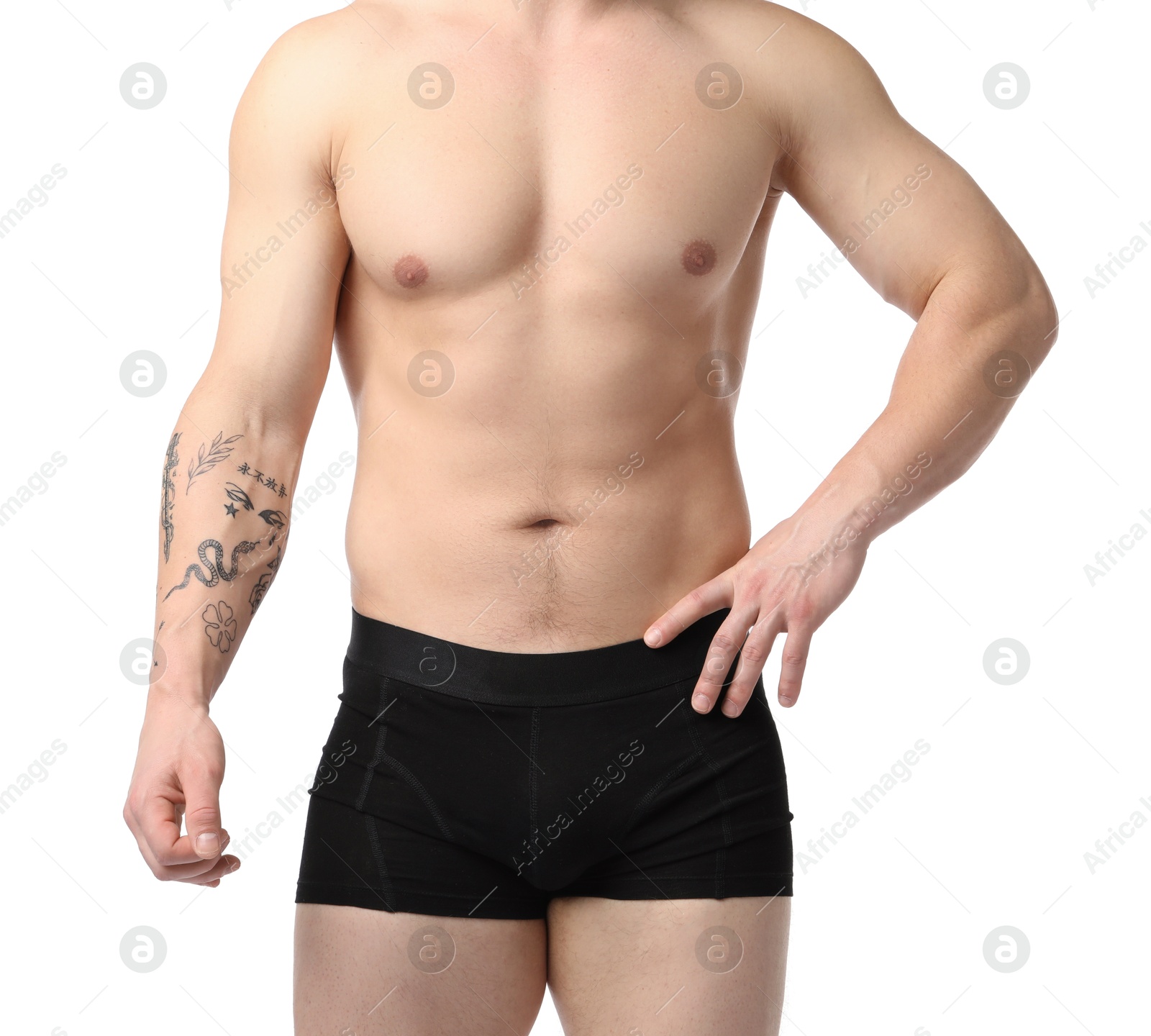 Young man in stylish black underwear on white background, closeup Photo of Young man in stylish black underwear on white background, closeup
