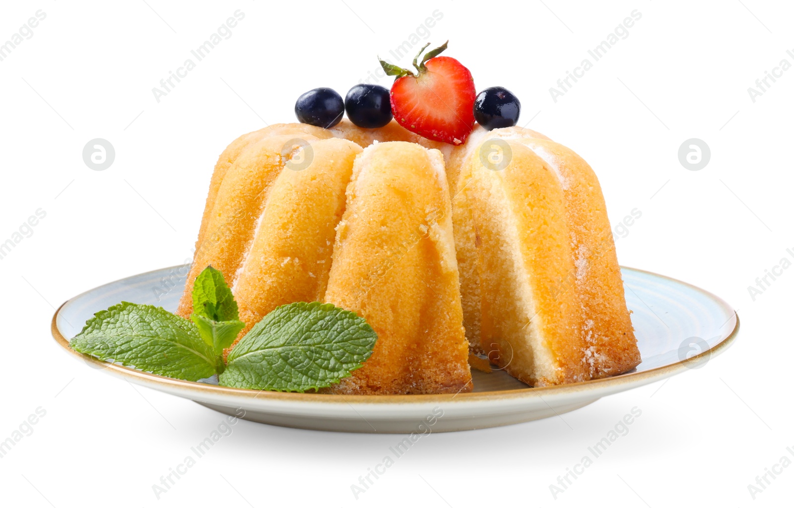 Tasty bundt cake with powdered sugar, berries and mint isolated on white Photo of Tasty bundt cake with powdered sugar, berries and mint isolated on white