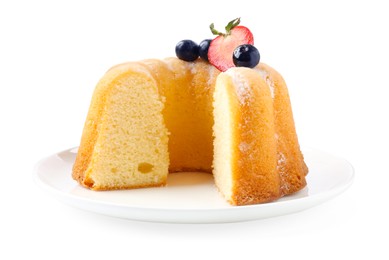 Photo of Tasty bundt cake with powdered sugar and berries isolated on white
