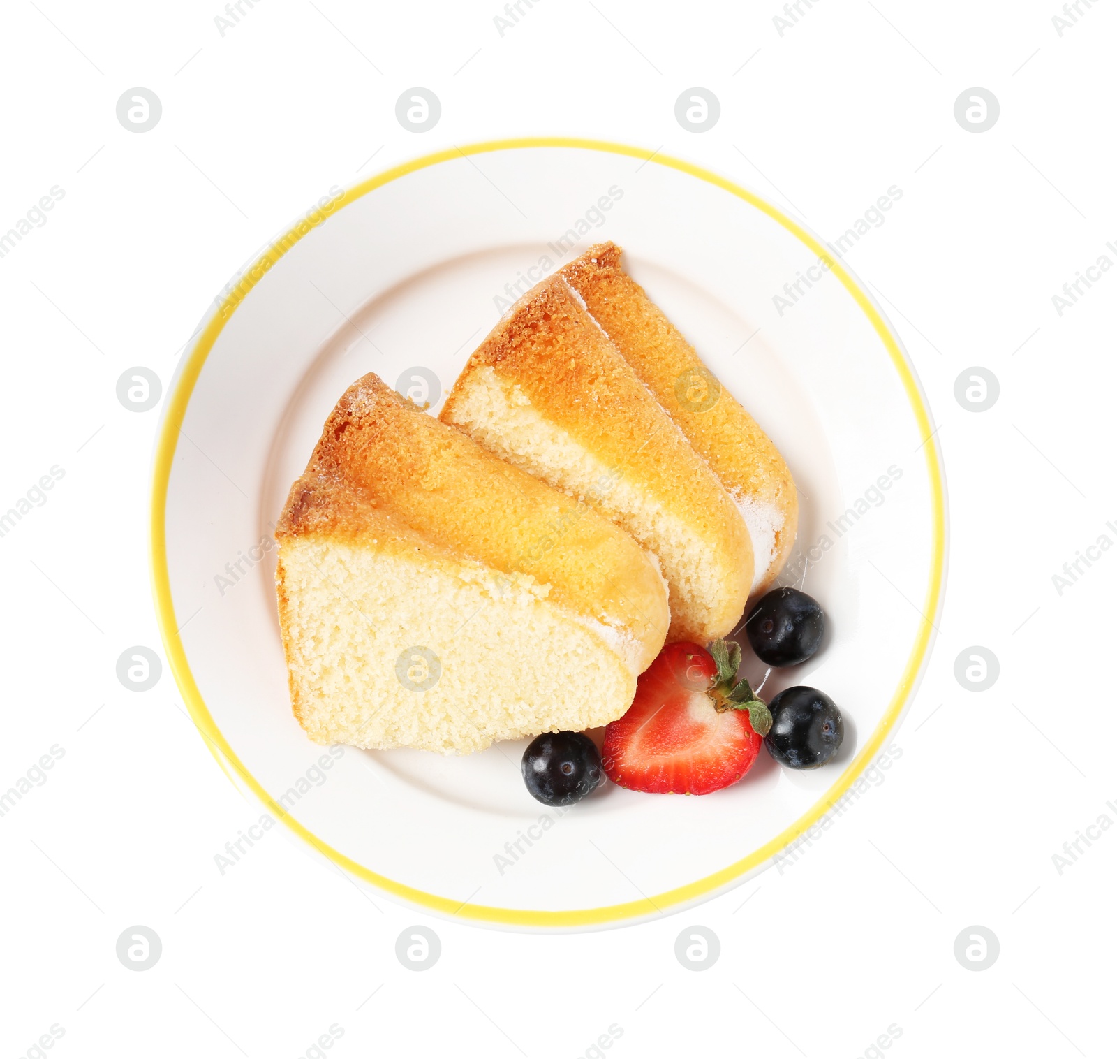 Pieces of tasty bundt cake with berries isolated on white, top view Photo of Pieces of tasty bundt cake with berries isolated on white, top view