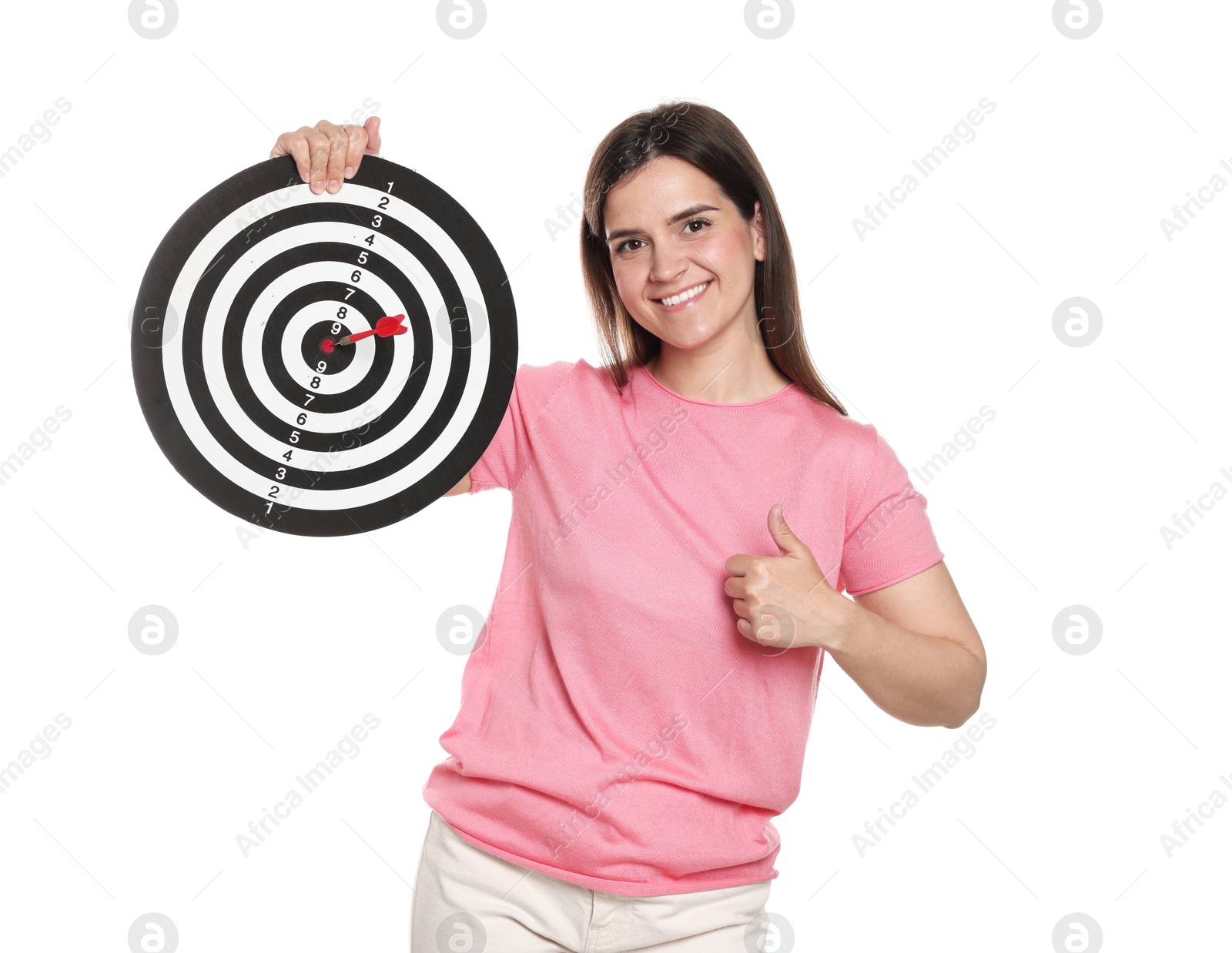Targeting. Smiling woman with dart board and arrow showing thumbs up on white background Photo of Targeting. Smiling woman with dart board and arrow showing thumbs up on white background