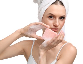 Photo of Beautiful woman with soap bar on white background