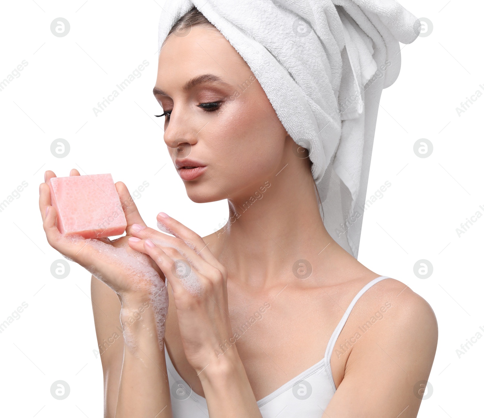 Photo of Beautiful woman with soap bar on white background