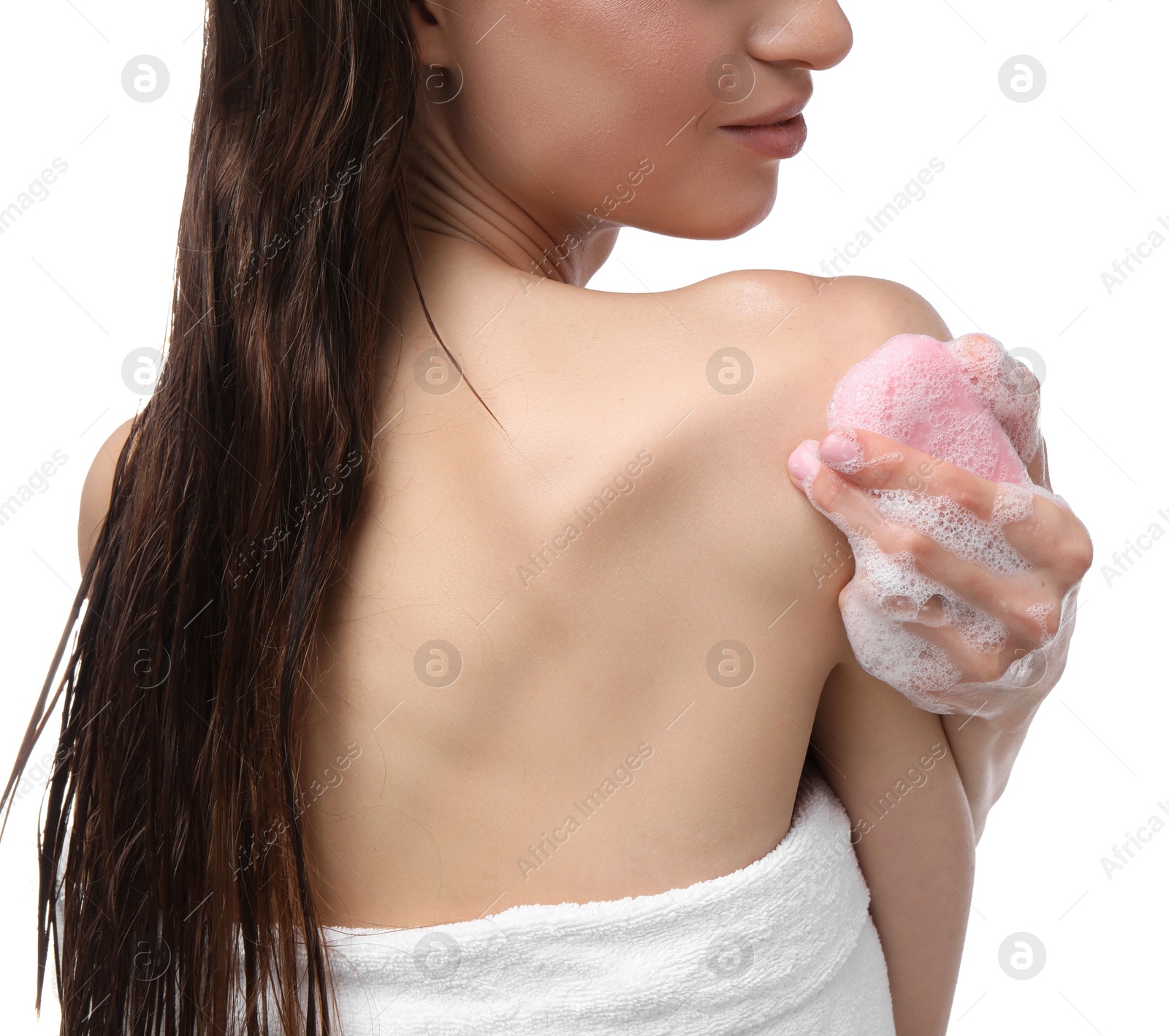 Photo of Woman washing body with soap bar on white background, closeup