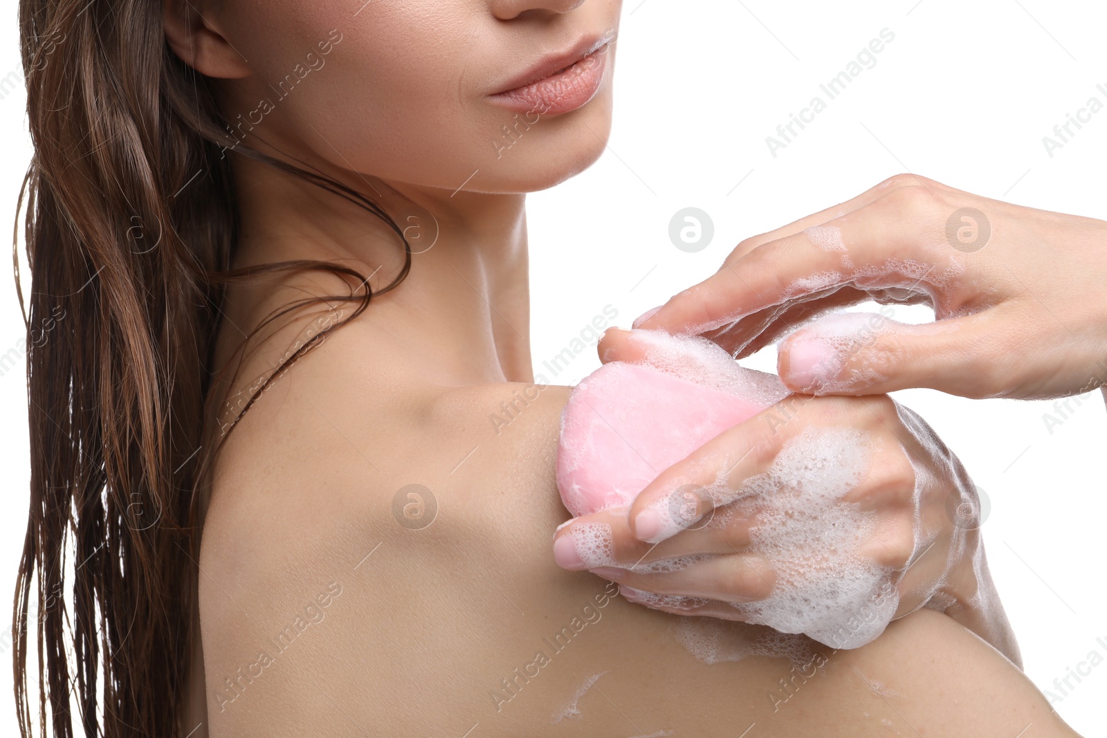 Woman washing body with soap bar on white background, closeup Photo of Woman washing body with soap bar on white background, closeup