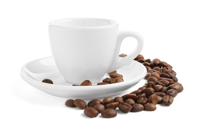 Photo of Ceramic cup with roasted coffee beans isolated on white