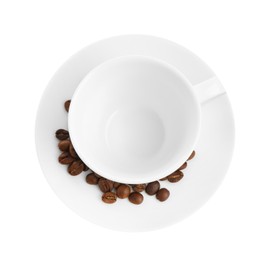 Photo of Ceramic cup with roasted coffee beans isolated on white, top view