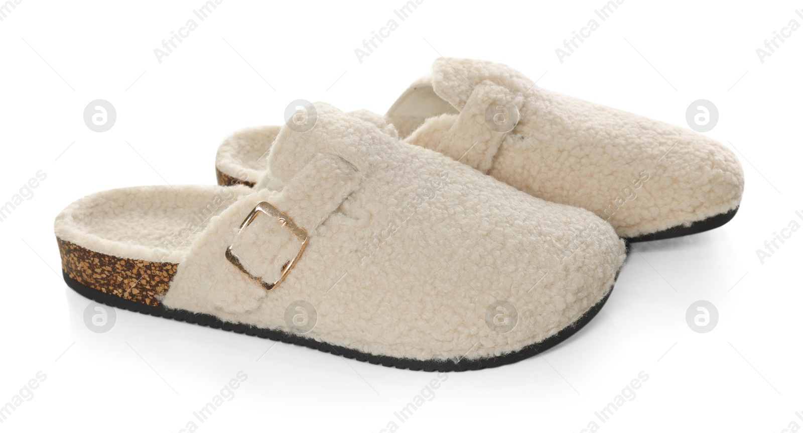 Pair of stylish slippers isolated on white Photo of Pair of stylish slippers isolated on white