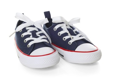 Photo of Pair of stylish dark blue sneakers isolated on white