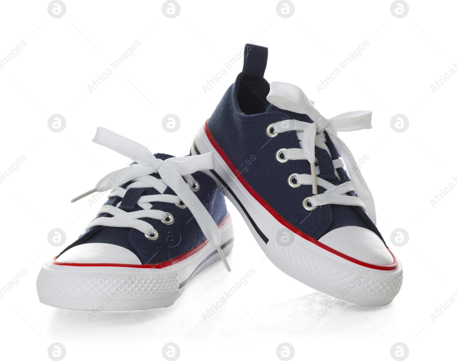 Pair of stylish dark blue sneakers isolated on white Photo of Pair of stylish dark blue sneakers isolated on white