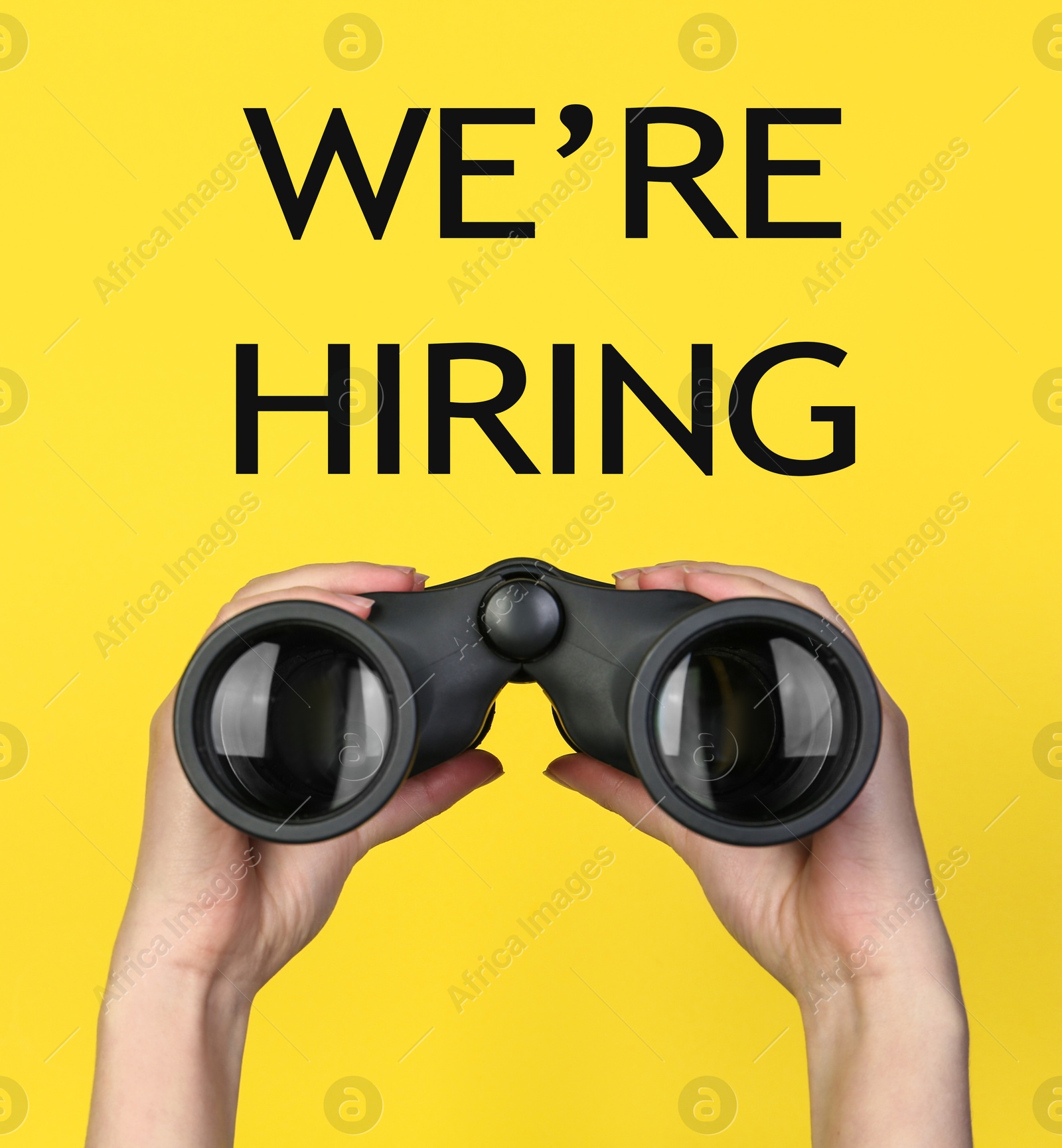 We Are Hiring. Woman with binoculars on yellow background, closeup. Recruitment, human resources concept Image of We Are Hiring. Woman with binoculars on yellow background, closeup. Recruitment, human resources concept