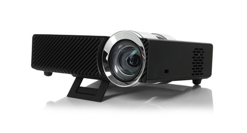 Photo of One modern video projector isolated on white