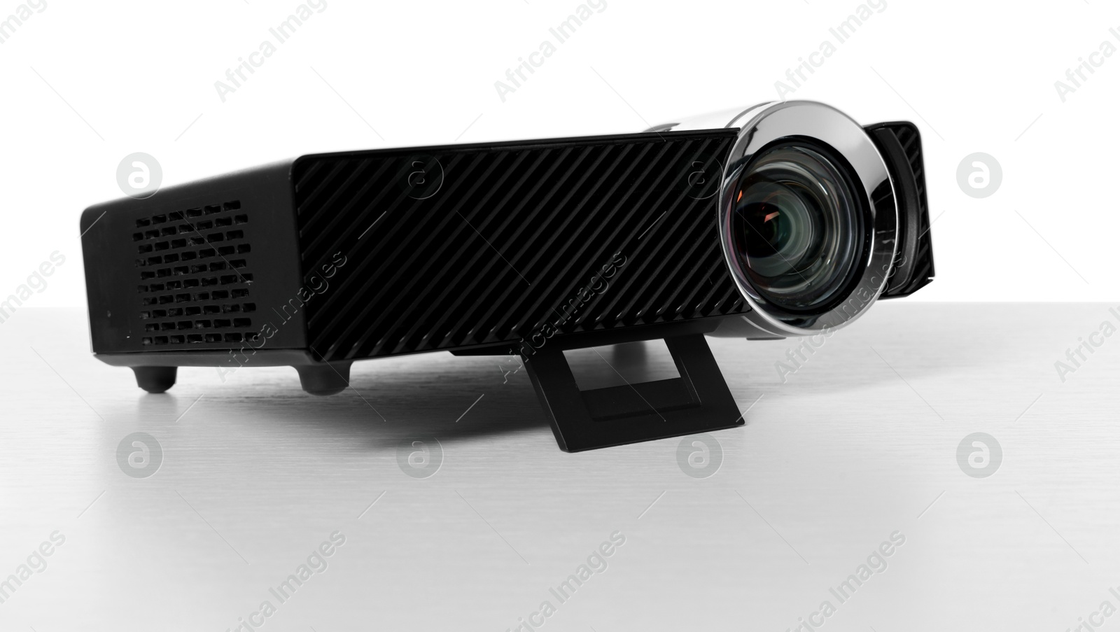 One modern video projector isolated on white Photo of One modern video projector isolated on white