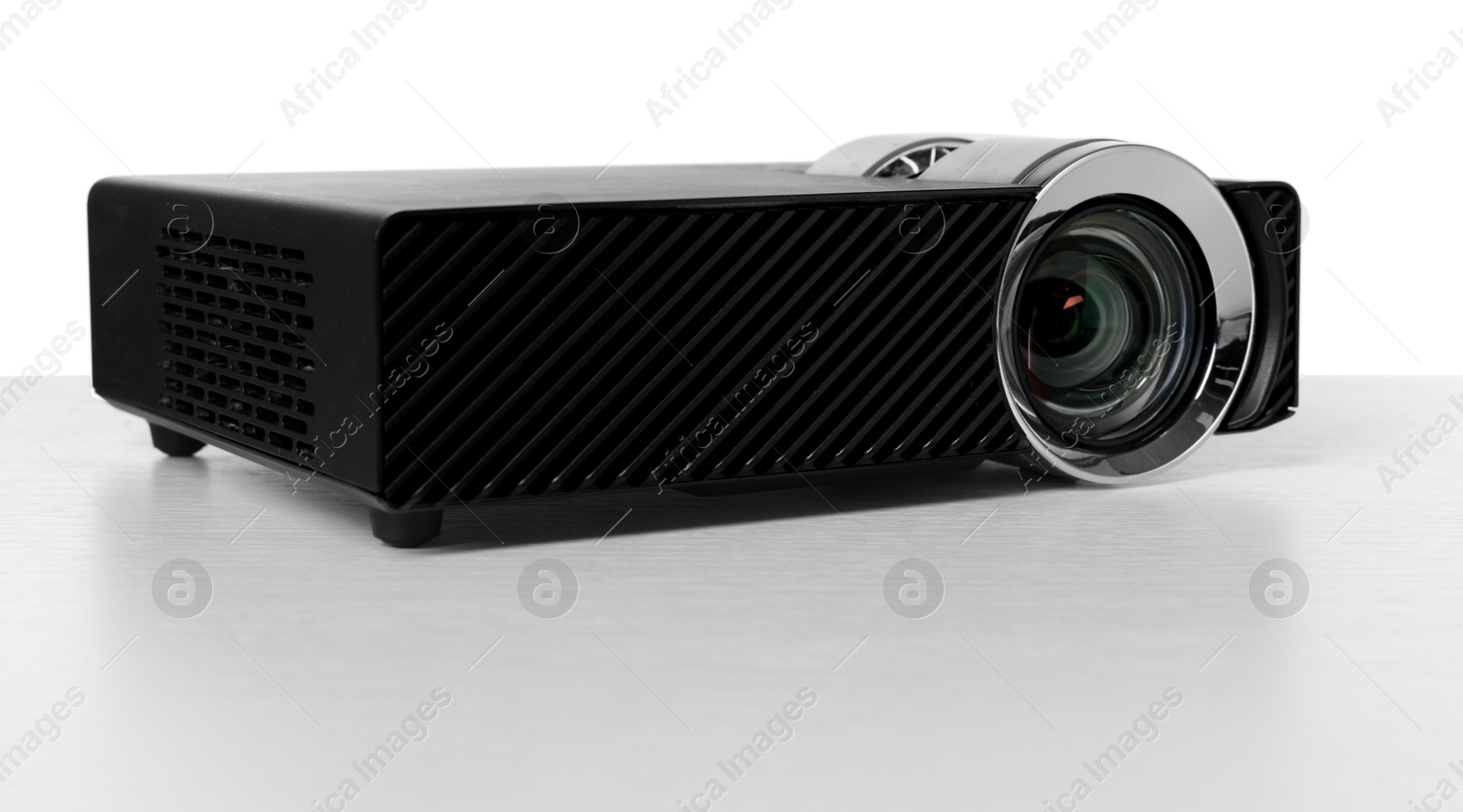 One modern video projector isolated on white Photo of One modern video projector isolated on white