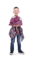Photo of Little boy with bouquet of lilac flowers on white background