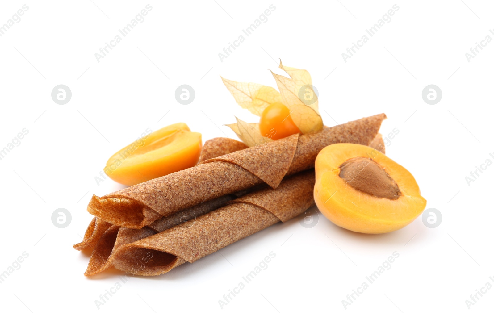 Tasty fruit leather rolls, apricot and physalis isolated on white Photo of Tasty fruit leather rolls, apricot and physalis isolated on white