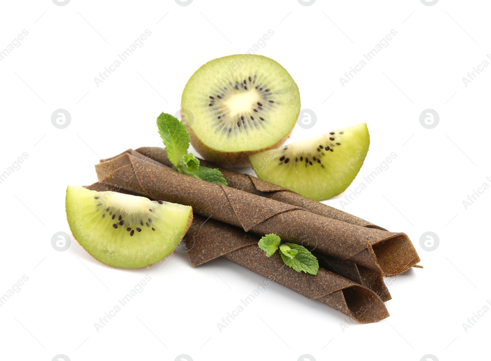 Tasty fruit leather rolls, kiwi and mint isolated on white Photo of Tasty fruit leather rolls, kiwi and mint isolated on white