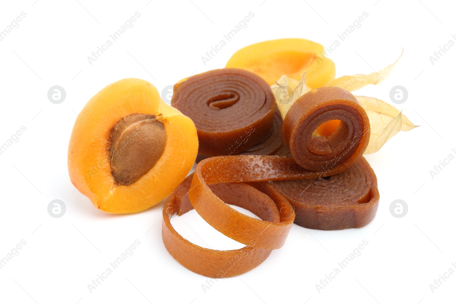 Tasty fruit leather, apricot and physalis isolated on white Photo of Tasty fruit leather, apricot and physalis isolated on white