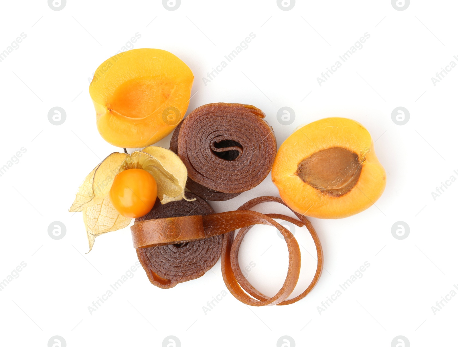 Tasty fruit leather, apricot and physalis isolated on white, top view Photo of Tasty fruit leather, apricot and physalis isolated on white, top view