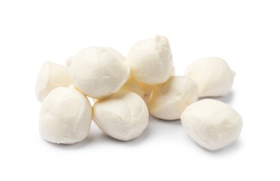 Photo of Many tasty mozzarella cheese balls isolated on white