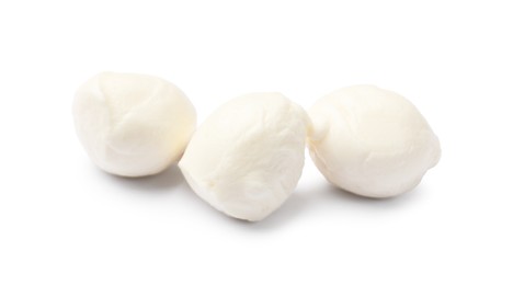 Photo of Three tasty mozzarella cheese balls isolated on white