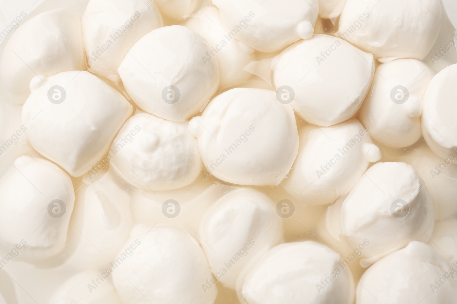 Tasty mozzarella cheese balls as background, closeup Photo of Tasty mozzarella cheese balls as background, closeup