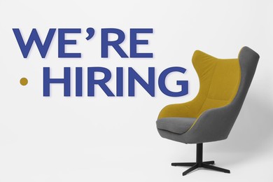 Image of We Are Hiring. Empty office chair on light background. Recruitment, human resources concept