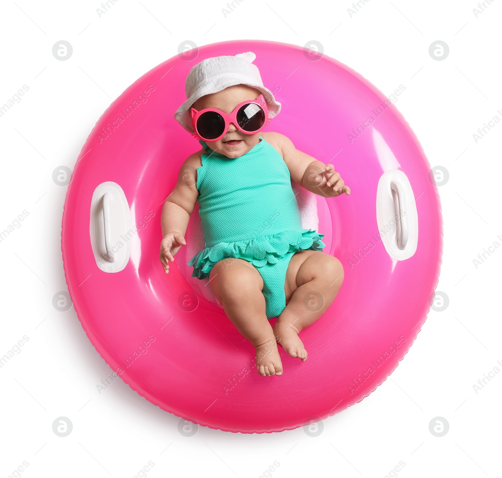 Cute little baby in sunglasses with inflatable ring on white background, top view Photo of Cute little baby in sunglasses with inflatable ring on white background, top view