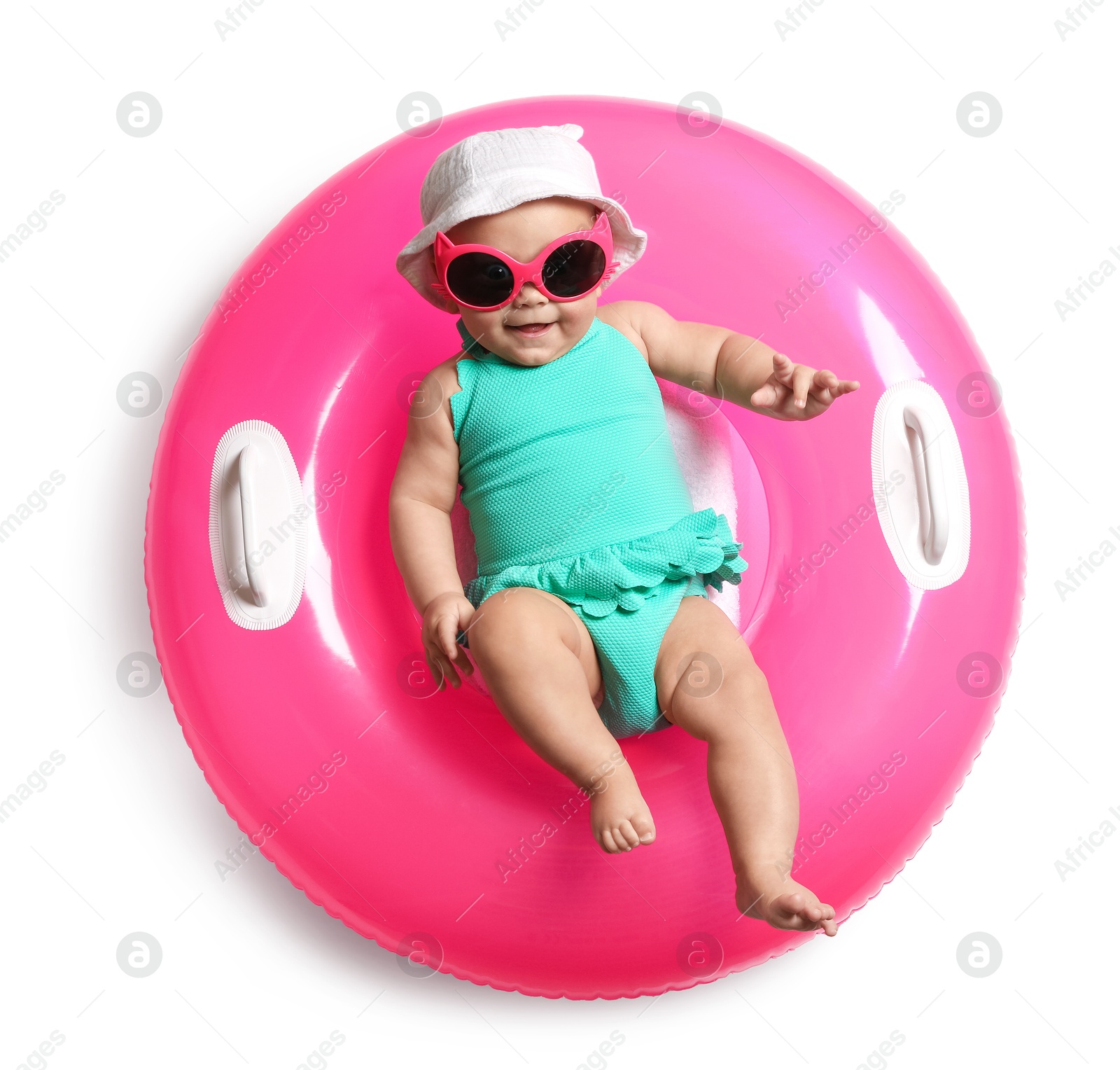 Cute little baby in sunglasses with inflatable ring on white background, top view Photo of Cute little baby in sunglasses with inflatable ring on white background, top view