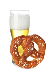 Photo of Tasty pretzel and glass of beer isolated on white