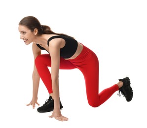 Photo of Runner in starting position on white background