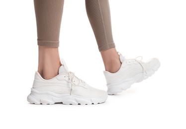 Photo of Runner in starting position on white background, closeup