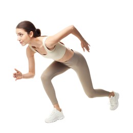Photo of Woman in sportswear running on white background
