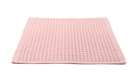 Photo of Clean pink waffle towel isolated on white