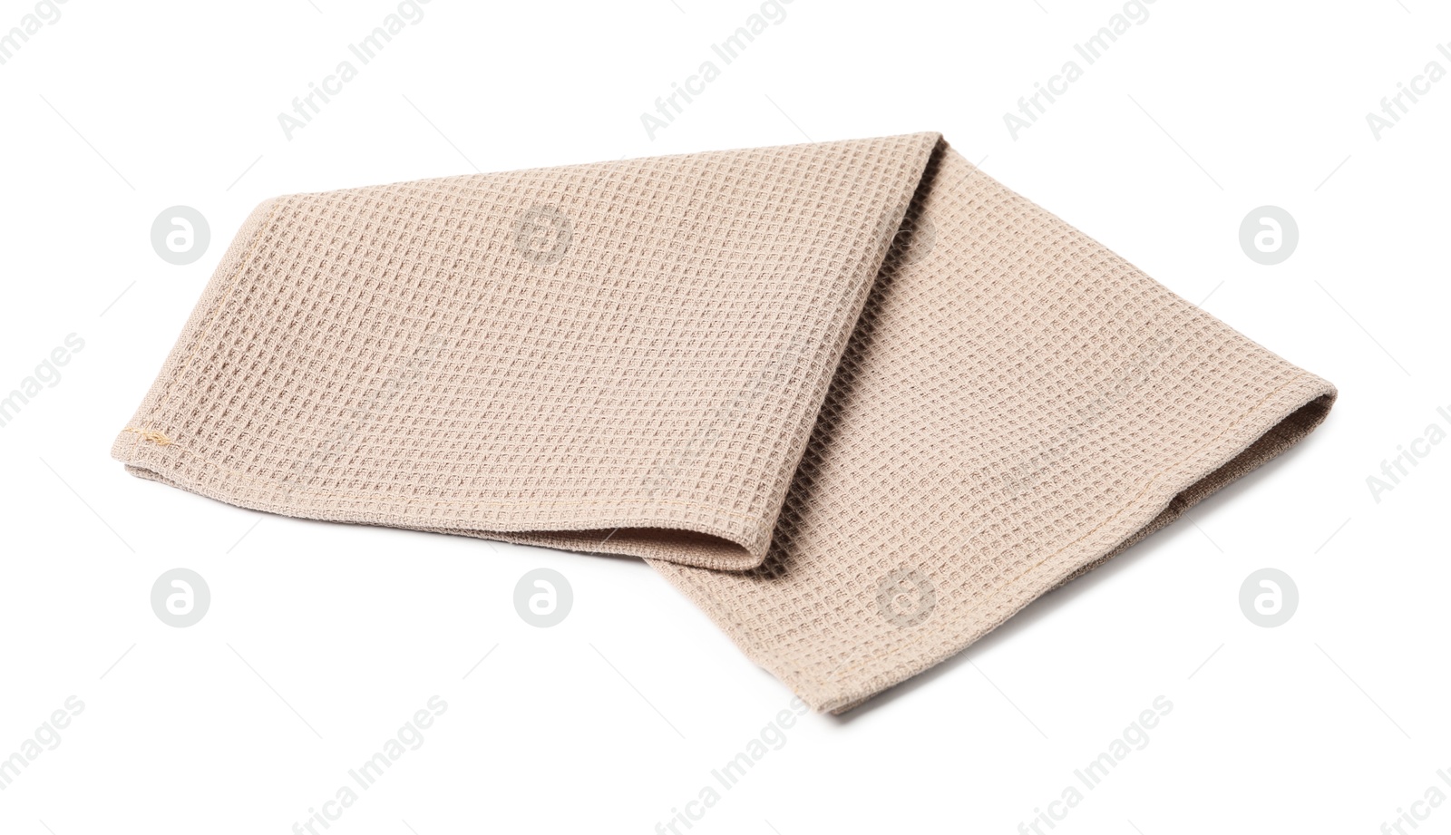 Clean beige waffle towel isolated on white Photo of Clean beige waffle towel isolated on white